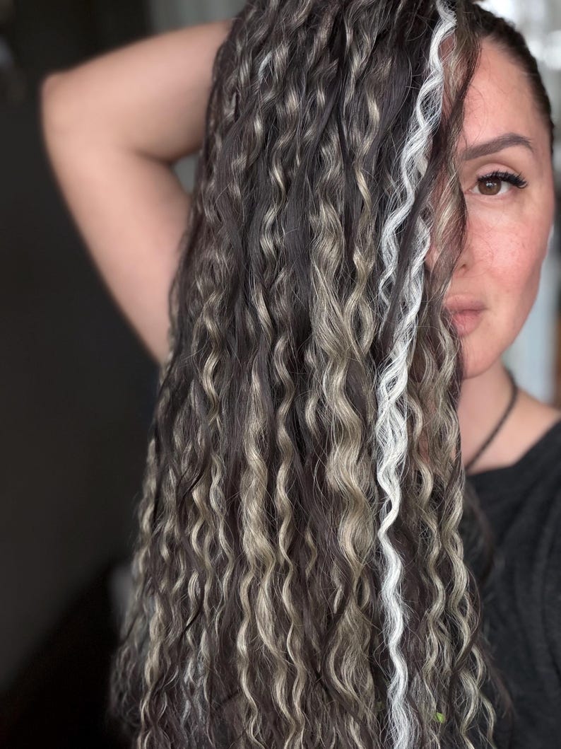 Installed handmade double ended dreadlock set demonstrating realistic density and natural movement